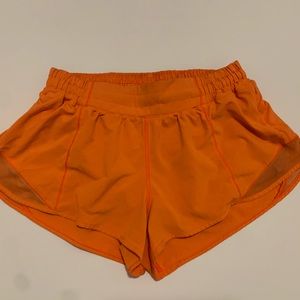 Orange Lululemon hotty hot shorts 2.5 length
